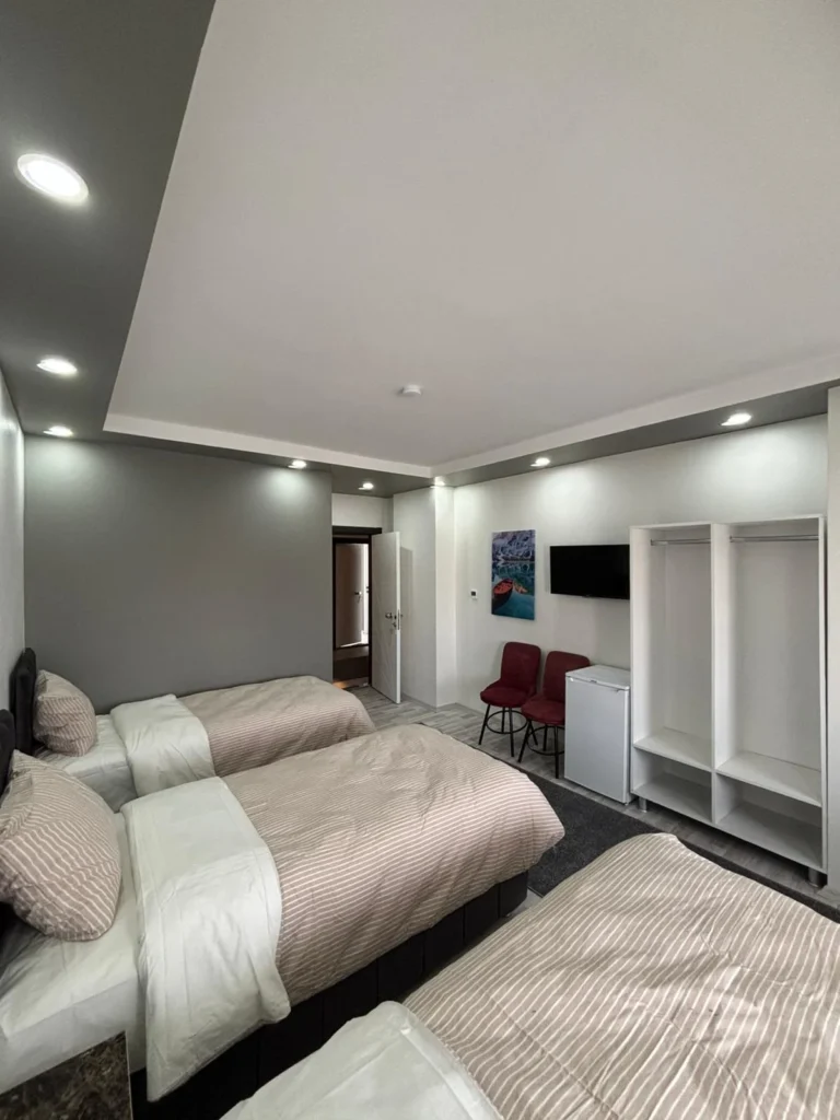 Erdem Otel şık ve modern tasarımlı oda konforlu yatak görünümü Sivas Şarkışla